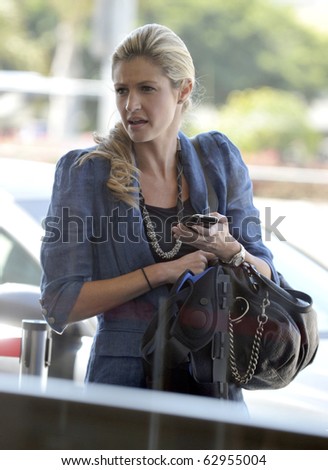 LOS ANGELES-JUNE 23: Television sports presenter Erin Andrews is seen at LAX. June 23rd, 2010 in Los Angeles