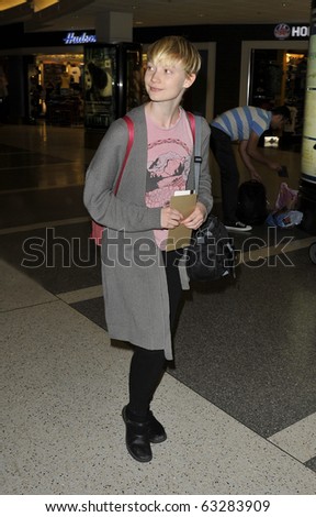 LOS ANGELES-JULY 23: Alice in Wonderland actress Mia Wasikowska is seen at LAX . July 23rd, 2010 in Los Angeles, California