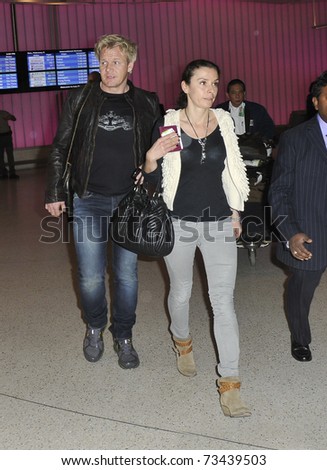 LOS ANGELES - FEBRUARY 6: Television Chef Gordon Ramsey and his wife seen at LAX airport. February 6th 2011 in Los Angeles, California