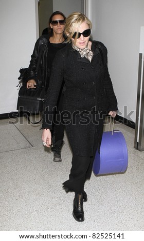 LOS ANGELES-FEBRUARY 26: Singer Madonna is seen at LAX airport. February 26, 2010 in Los Angeles, California