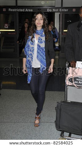 LOS ANGELES-FEBRUARY 27: Actress Emmy Rossum is seen at LAX airport. February 27 in Los Angeles, California 2010