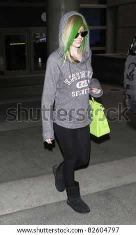 LOS ANGELES-MAY 14: Singer Avril Lavigne at LAX airport. May 14 in Los Angeles, California 2010