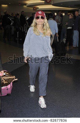LOS ANGELES-APRIL 5: Actress Kristin Chenoweth at LAX airport. April 5, 2011 in Los Angeles, California
