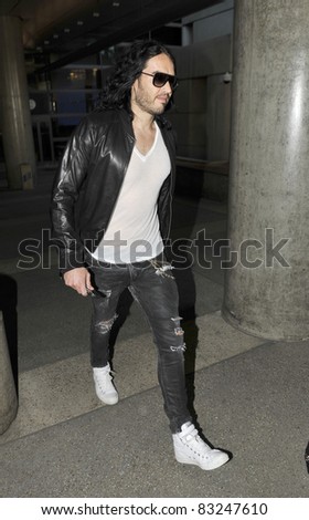 LOS ANGELES-APRIL 23: Actor Russel Brand at LAX airport. April 23 in Los Angeles, California 2011