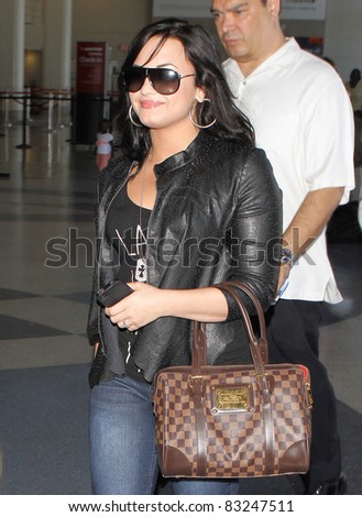 LOS ANGELES-APRIL 23: Actress/singer Demi Lovato at LAX airport. April 23 in Los Angeles, California 2011