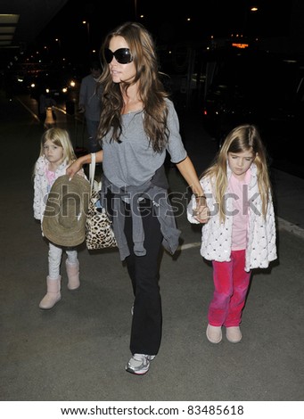 LOS ANGELES-MARCH 30: Actress Denise Richards at LAX airport. March 30 in Los Angeles, California 2011