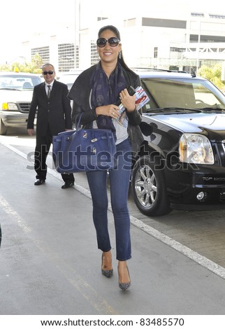 LOS ANGELES-MARCH 29: Model Kimora Lee Simmons at LAX airport. March 29 in Los Angeles, California 2011