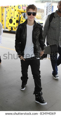 LOS ANGELES-MARCH 2: Singer Justin Bieber at LAX airport. March 2 in Los Angeles, California 2011