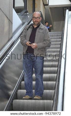 LOS ANGELES-AUGUST 17: Actor Paul Giamatti arrives at LAX airport, August 17, 2011 in Los Angeles, California