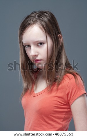 Studio Portrait Of A Pretty, Eleven Years Old Girl Stock Photo 48875563