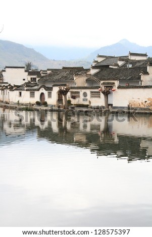 medieval Chinese village of Hongcun and reflection, a unesco world heritage site in China