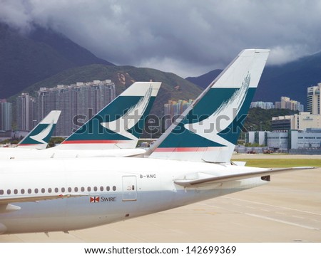HONG KONG - NOV 25: Cathay Pacific\'s aircraft at the airport on Nov 25, 2009. Cathay Pacific is an international flag carrier of Hong Kong which service to 168 destinations in 42 countries worldwide.
