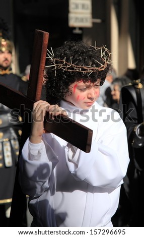 PALERMO, ITALY - APRIL 2: Italian child actor from the Catholic church of Palermo dresses up as Jesus during Easter parade on Good Friday on April 2, 2010 in Palermo, Italy