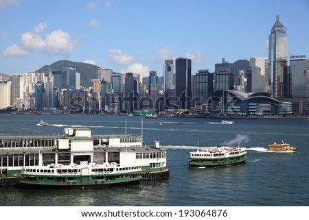 HONG KONG - JUNE 30, 2013: Star Ferry Tsimshatsui pier on June 30, 2013 in Hong Kong, China. Star Ferry pier has been in operation at Victoria Harbor for more than 120 years.