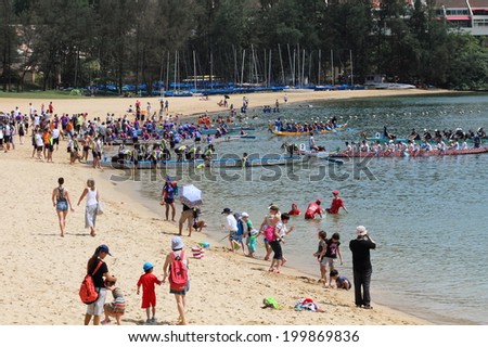 HONG KONG - JUNE 1, 2014: Crowds gather at Discovery Bay to celebrate the 2014 Dragon Boat festival on June 1, 2014 in Hong Kong.