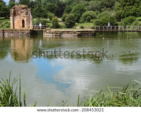 SUSSEX, ENGLAND - JUNE 11, 2014: View of the garden of Sussex Castle on June 11, 2014 in Sussex, England. It is one of the most visited castle gardens in Sussex and a landmark in England.