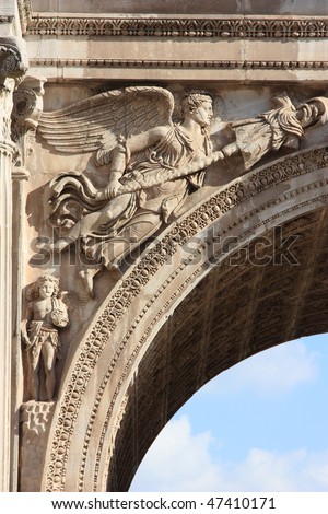 Roman Forum in Rome: details of ancient white marble triumph arch, Septimius Severus
