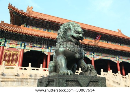 oriental design of Forbidden city palace and guardian lion in Beijing, China