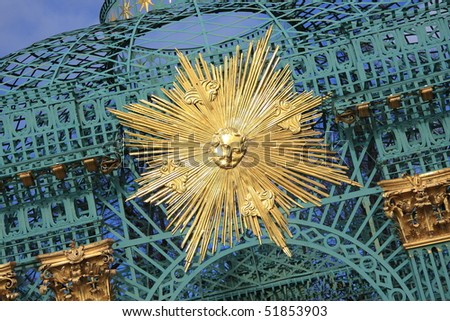 golden star badge on the royal pavilion in the palace garden of Schloss Sanssouci in Potsdam, Germany