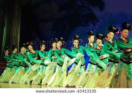 XIAN - FEBRUARY 21: Group of Chinese female dancers performed traditional Tang dynasty dance onstage at Xian Theater on 21 February, 2006 in Xian, China