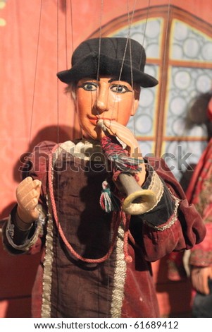 LUBECK - JUNE 8: medieval puppet musician performs puppet show at TheaterFiguren on June 8, 2010 in Lubeck, Germany