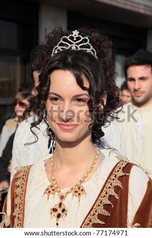 VENICE - FEBRUARY 26: Unidentified beautiful actress performing the role of medieval princess at the parade of the annual Venice Carnival festival on February 26, 2011 in Venice, Italy.