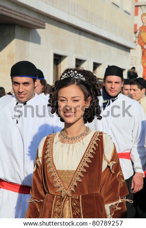 VENICE, ITALY - FEBRUARY 26: Unidentified beautiful actress performing the role of medieval princess at the parade of the annual Venice Carnival festival on February 26, 2011 in Venice, Italy.