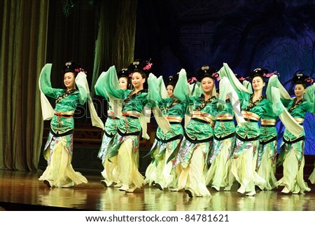 XIAN, CHINA - FEBRUARY 21: Group of Chinese female dancers performed traditional Tang dynasty dance onstage at Xian Theater on February 21, 2006 in Xian, China
