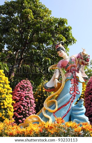 Chinese fairy statue in the garden of Yuen Yuen Institute, temple in Hong Kong dedicated to all three major Chinese religions: Taoism, Buddhism and Confucianism.