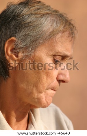 profile of an old woman thinking