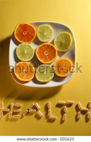 dish of fruit with capsule writing underneath