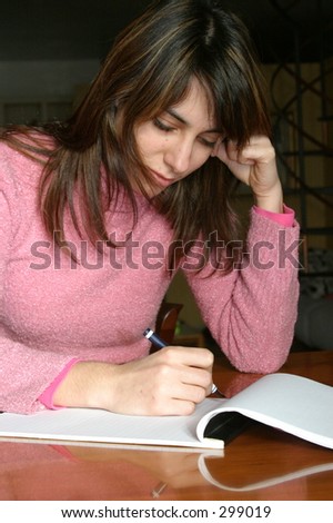 Writing A Letter. woman writing a letter