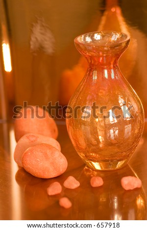 orange stones with orange vase