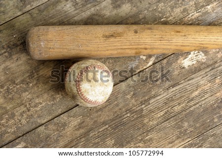 baseball bat and ball on old floor