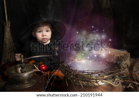 cute little halloween witch with cauldron and smoke