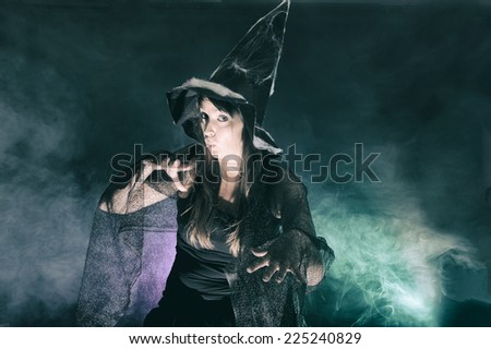 Halloween witch on smoke green and purple background
