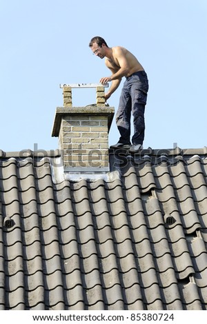young man on a roof