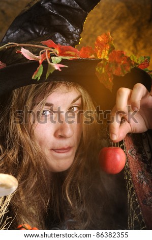 witch giving a poisoned apple.