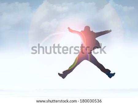 Businessman jumping in excitement
