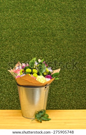 bouquet of flowers in a bucket