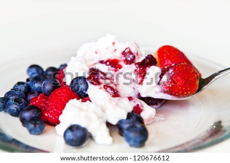 Low fat breakfast. Cottage cheese with blueberry, raspberries and strawberry.