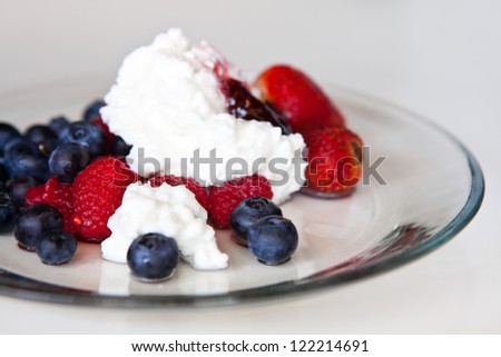 Low fat breakfast. Cottage cheese with blueberry, raspberries and strawberry.