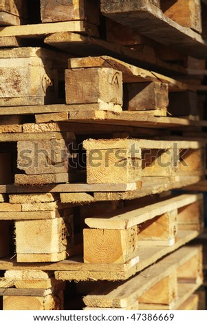 Uneven Bars of wood stacked in a sawmill