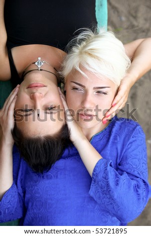 Portraits of two young women, top view