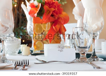  of a wedding table place setting with colorful centerpiece made up of