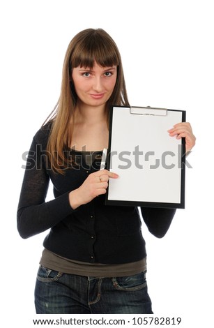 Young woman in jeans and dark blouse with clipboard in hands. Isolated on a white background.