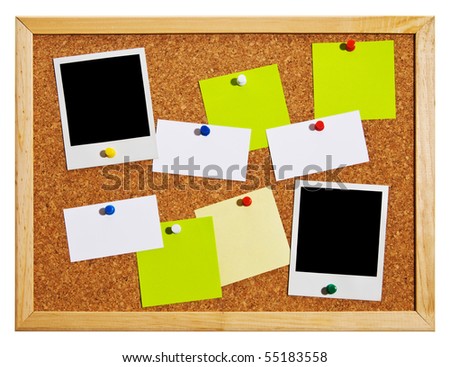 Cork bulletin board with notes, business cards and instant photo cards.