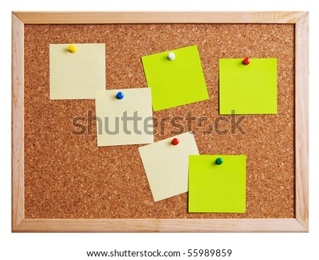 Cork bulletin board with notes.