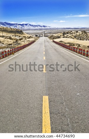 Desert Highway.This is the highway which stretches through the desert in Qinghai Province.