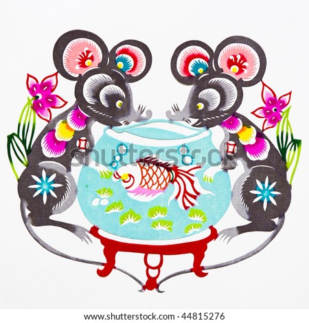 mouse,This is a picture of Chinese paper cutting, representing the Chinese Zodiac, such as mouse, ox, and tiger. Paper-cutting is one of the traditional Chinese arts and crafts.